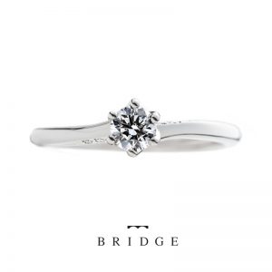 シンプルでかわいいオシャレなウェーブラインの婚約指輪