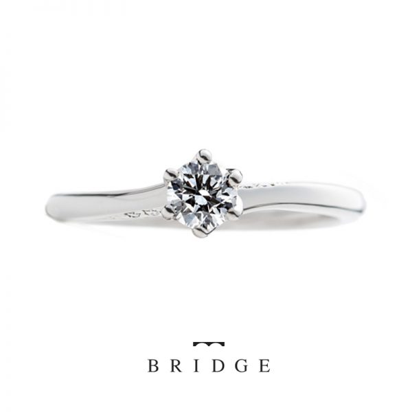 シンプルでかわいいオシャレなウェーブラインの婚約指輪