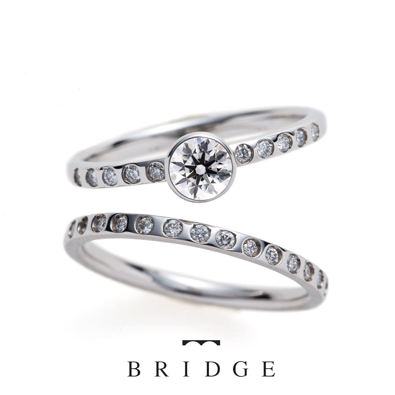 Love SYZYGY ï¼ Sunset Beach　BRIDGE銀座がおススメするダイヤモンドの輝きと夕陽のデザインが美しいシンプルな大人可愛い婚約指輪、結婚指輪