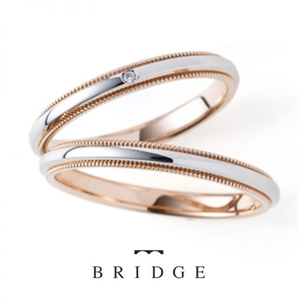 プラチナの素材にゴールドのミルグレインがオシャレな結婚指輪