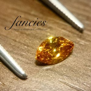 マーキースカットが美しいイエローオレンジのダイヤモンド