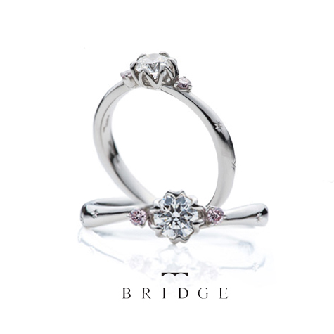 サイドのピンクダイヤがかわいい結婚指輪婚約リングの銀座ブリッジアントワープブリリアント