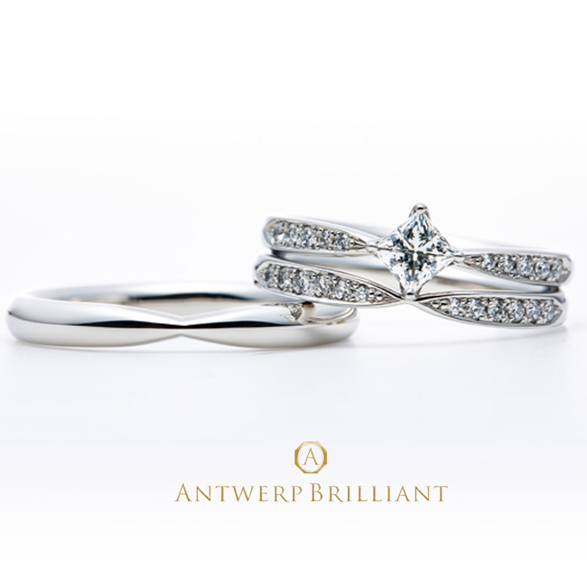 結婚指輪と重ねつけして一層ゴージャスなプリンセスカットは一番星モチーフ　リボンみたい指が細く見える愛され結婚リング銀座の花嫁にも人気で普段使いもきれい
