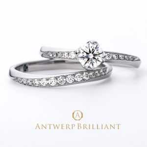 ダイヤモンドラインの美しい婚約指輪と結婚指輪の重ね付け