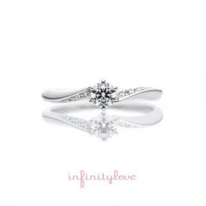 ダイヤモンドラインが美しいシンプルなプラチナのウェーブデザインの婚約指輪が銀座で人気です。