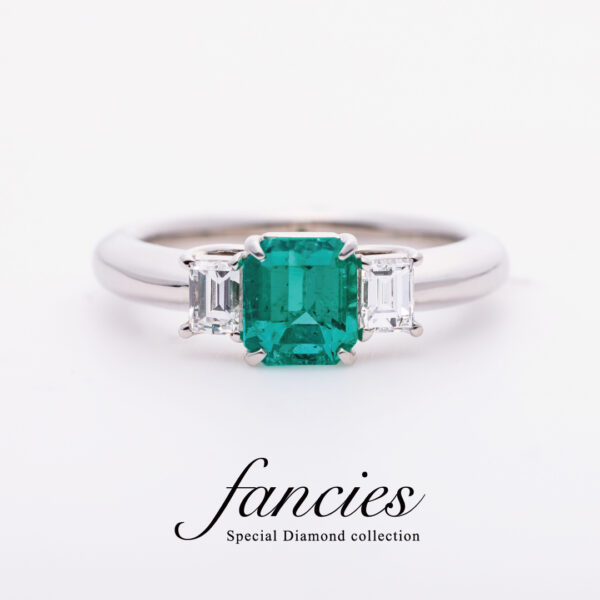 Emerald platinum engagement ring
