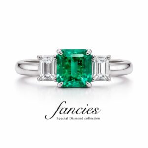 Emerald platinum engagement ring